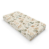 Fern Grove Dinosaurs changing pad cover on a nursery changing table