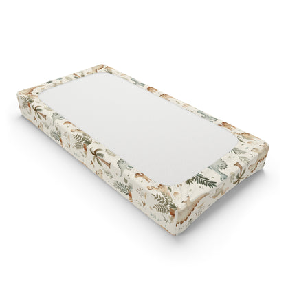 Changing pad cover with watercolour dinosaurs among palms