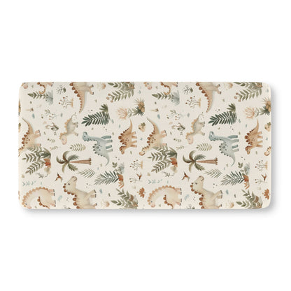 Fitted crib sheet with sage dinosaurs and ferns on cream