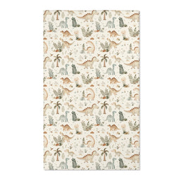 Dinosaur nursery area rug in sage and tan on cream