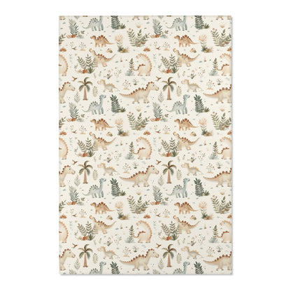 Close detail of the dinosaurs and palms on the nursery area rug