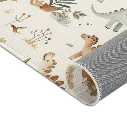 Nursery area rug in a sage, tan and cream palette