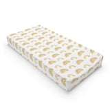 Golden Arches changing pad cover on a nursery changing table