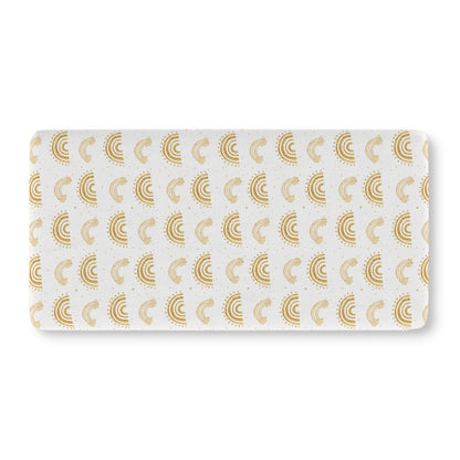 Fitted crib sheet with gold rainbow arches and stars on white
