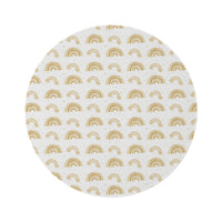 Golden Arches round nursery rug on a baby room floor