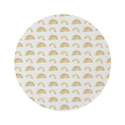 Golden Arches round nursery rug on a baby room floor