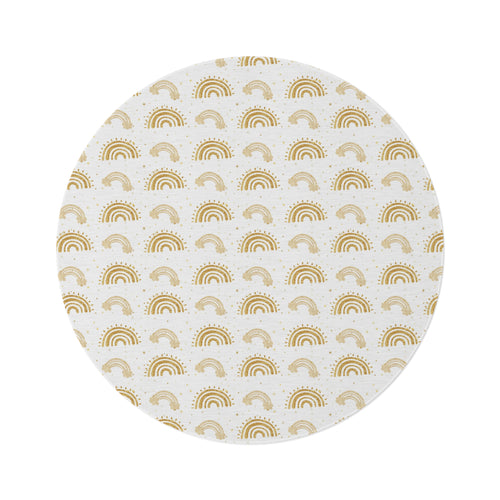 Golden Arches round nursery rug on a baby room floor