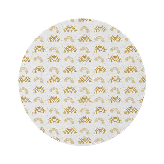 Golden Arches round nursery rug on a baby room floor
