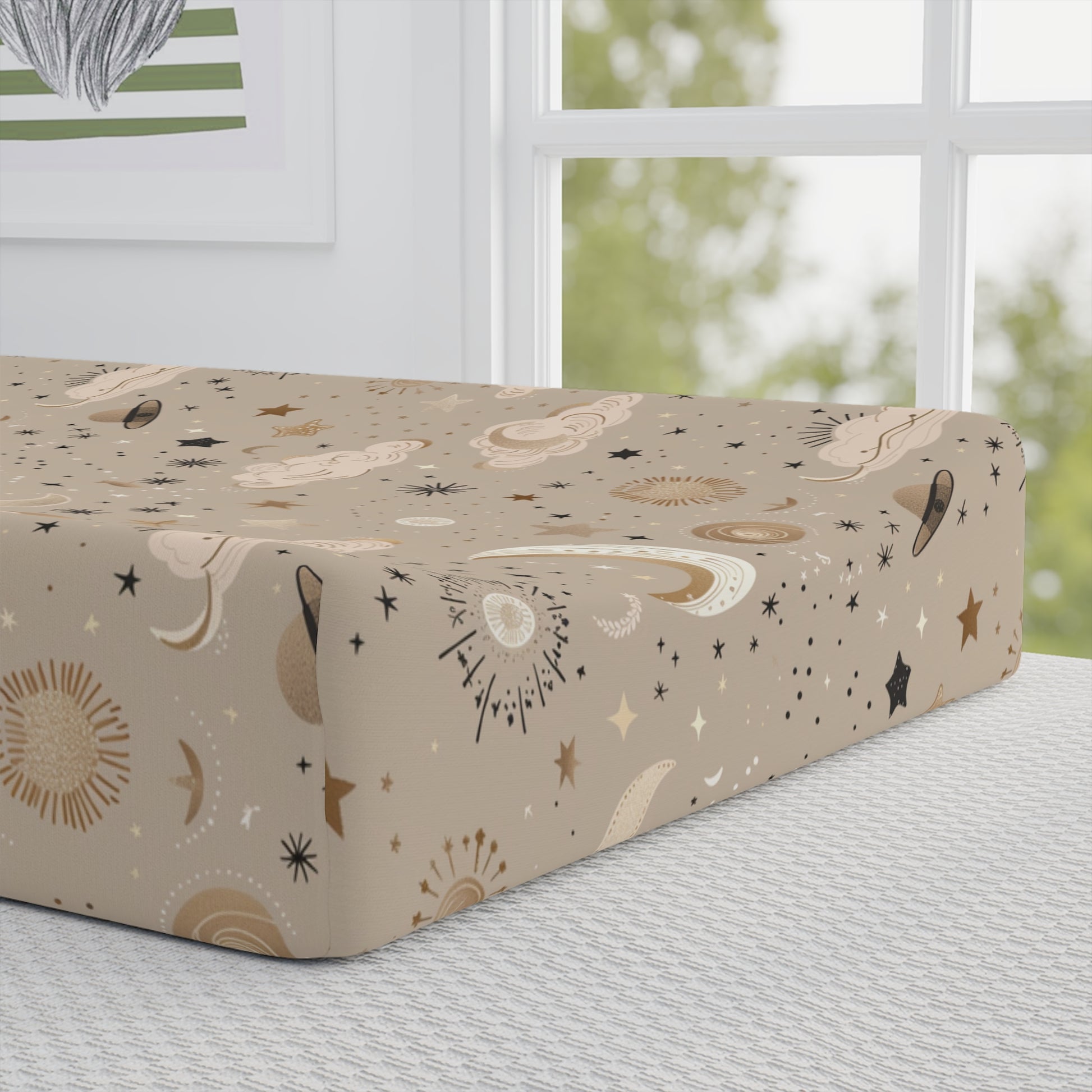Close detail of the Golden Cosmos print on the changing pad cover