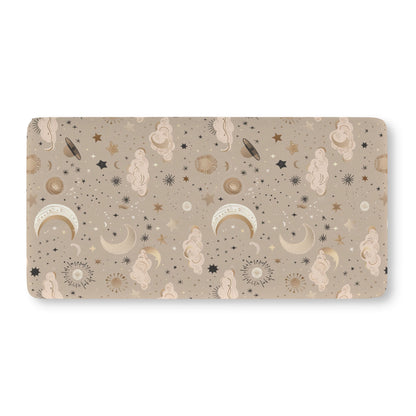 Fitted crib sheet with gold moons, suns and stars on taupe