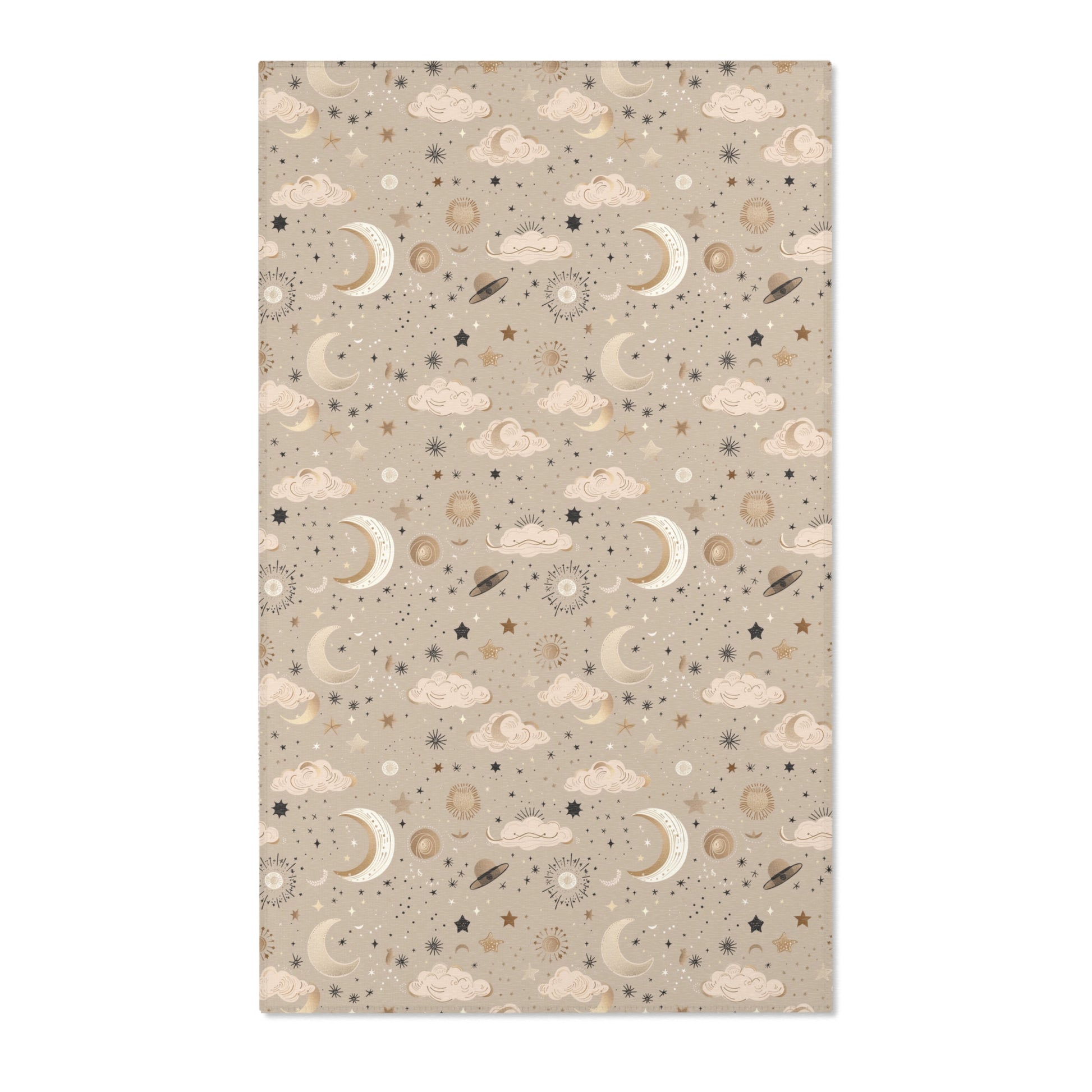 Celestial nursery area rug in gold and cream on warm taupe