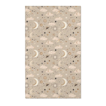 Celestial nursery area rug in gold and cream on warm taupe