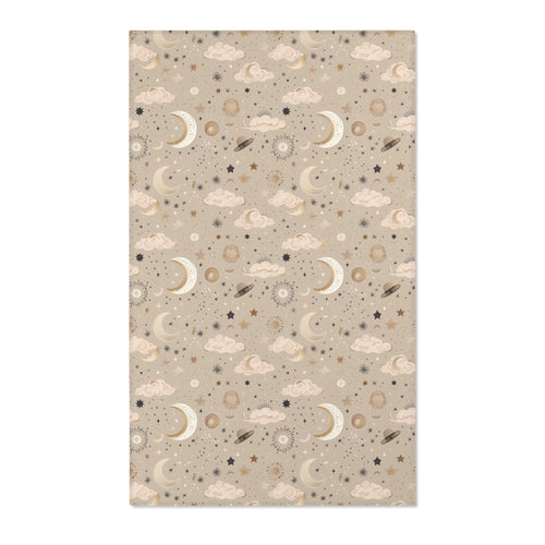 Celestial nursery area rug in gold and cream on warm taupe
