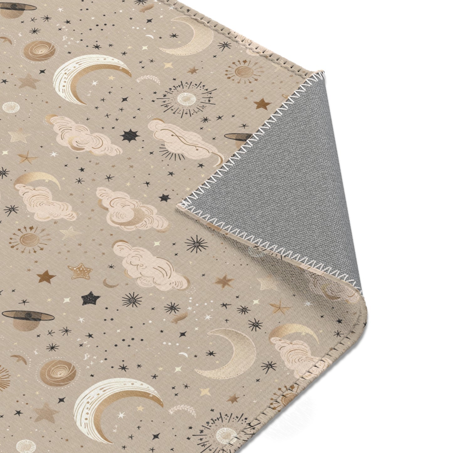 Nursery area rug printed edge to edge with moons and stars