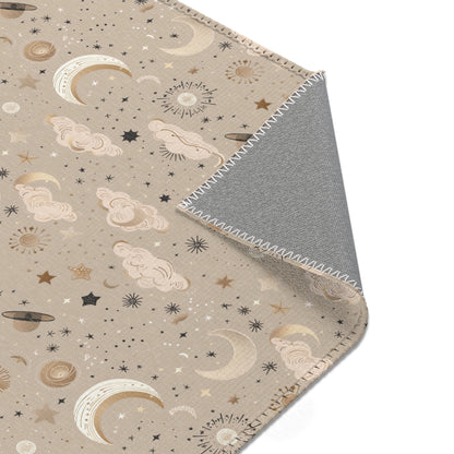 Nursery area rug printed edge to edge with moons and stars