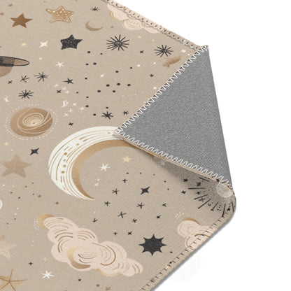 Celestial rug in gold and cream on taupe for a nursery floor