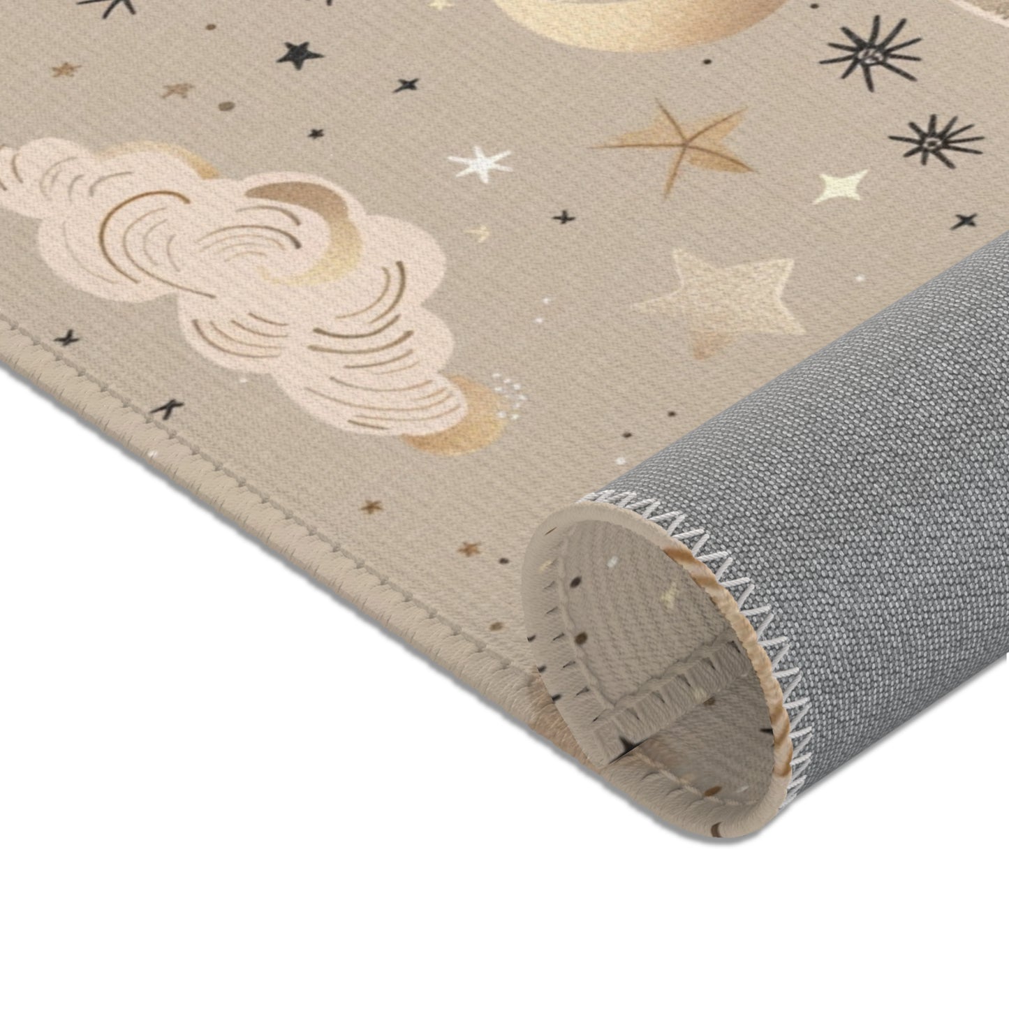 Nursery area rug in a warm taupe, gold and cream palette