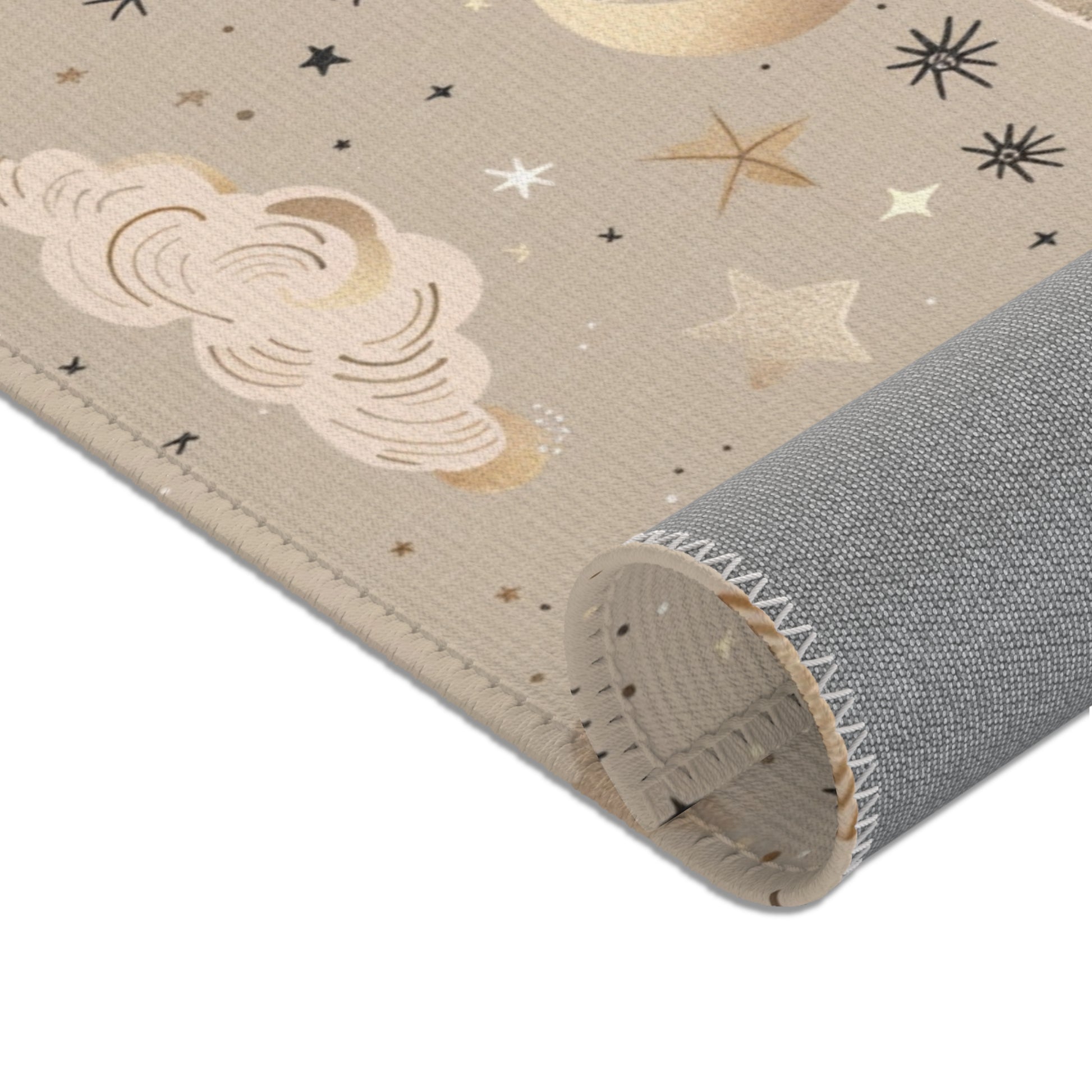 Nursery area rug in a warm taupe, gold and cream palette