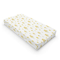 Golden Meadow changing pad cover on a nursery changing table