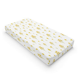 Golden Meadow changing pad cover on a nursery changing table