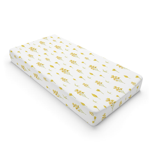 Golden Meadow changing pad cover on a nursery changing table