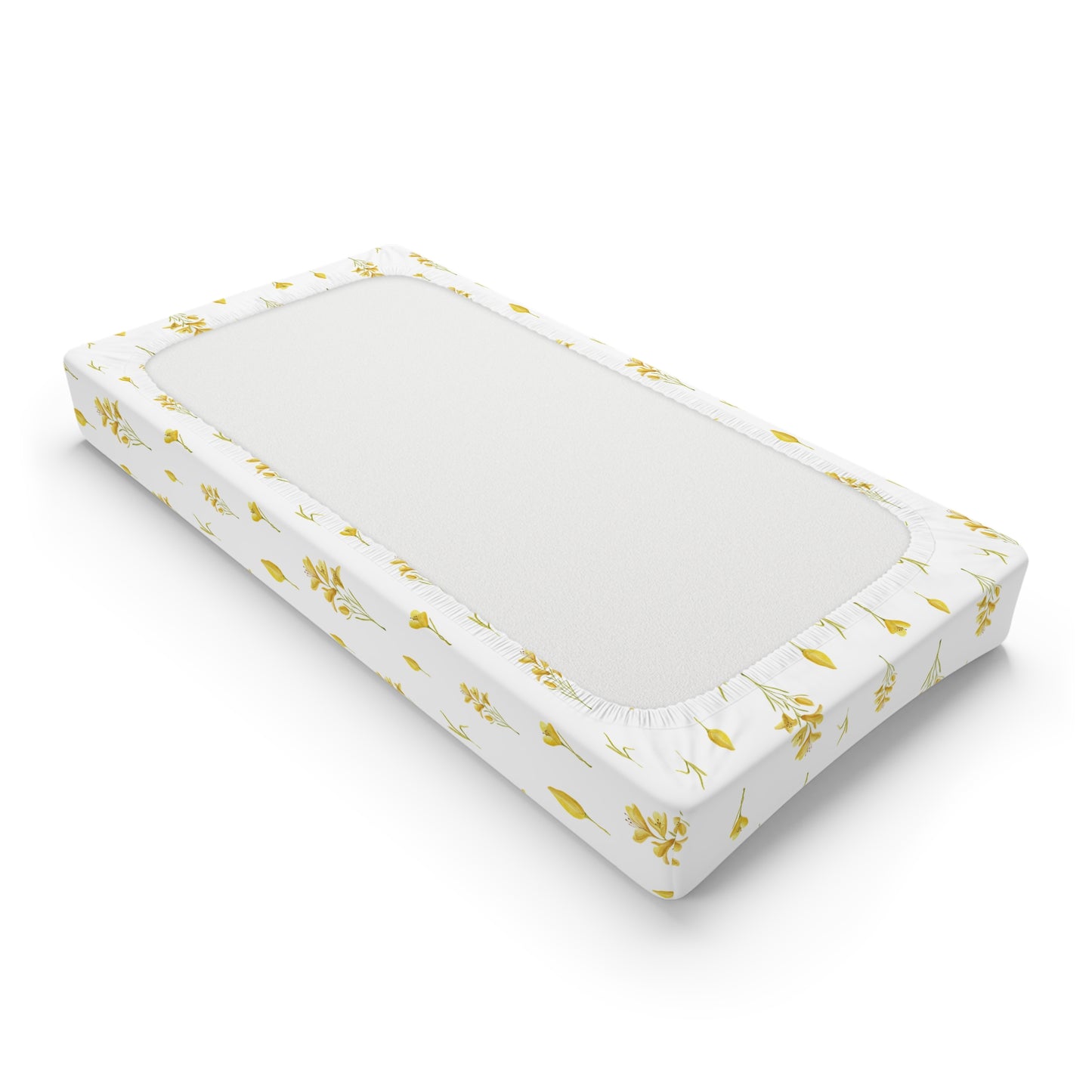 Fitted changing pad cover in mustard florals with elastic edges