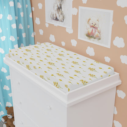 Close detail of the Golden Meadow print on the changing pad cover