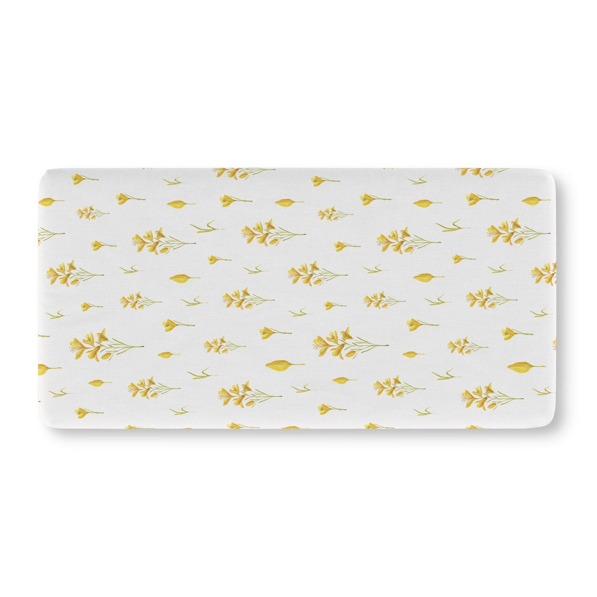 Yellow floral crib sheet on a standard crib mattress