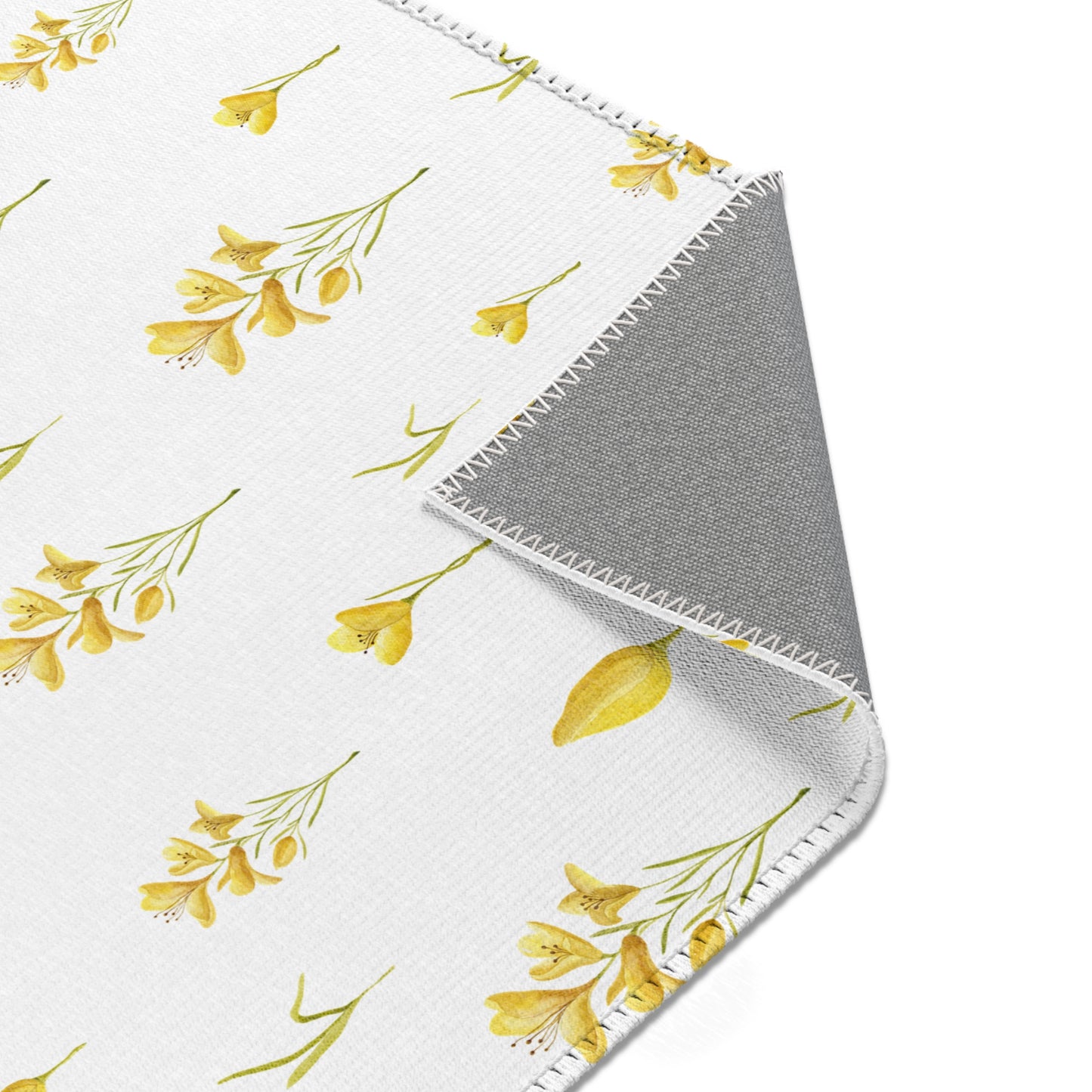 Golden Meadow rug, yellow blooms and green stems on linen