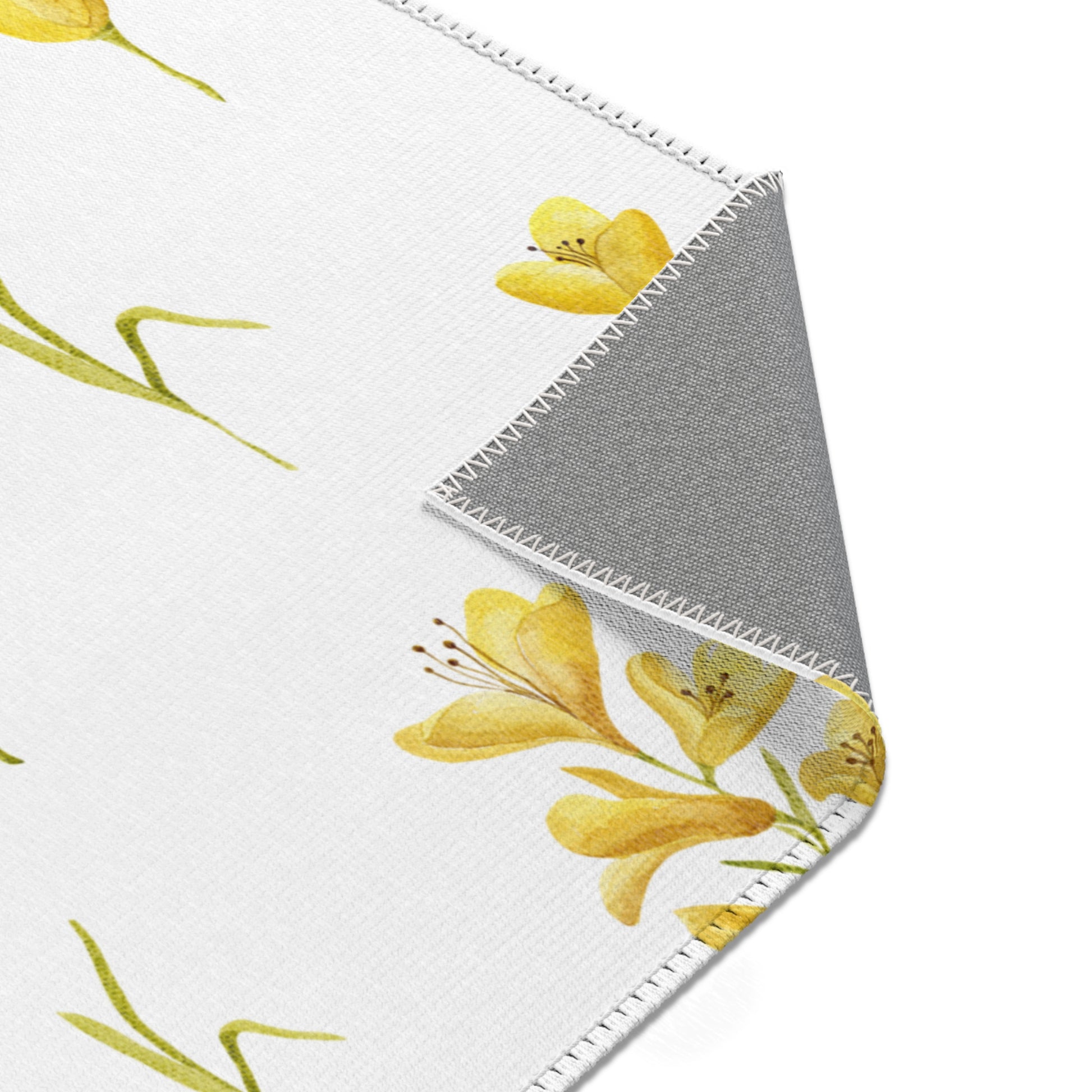 Mustard freesia print rug in a small baby room