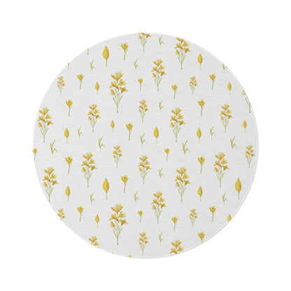 Golden Meadow round nursery rug on a baby room floor