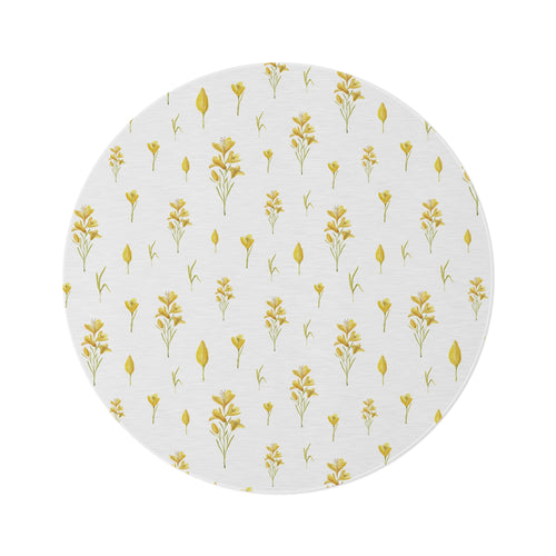 Golden Meadow round nursery rug on a baby room floor