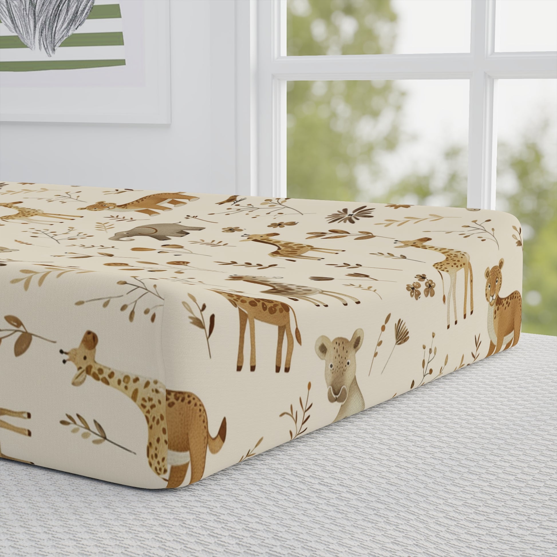 Close detail of the Golden Savanna print on the changing pad cover