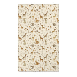 Safari nursery area rug in tan and brown on cream