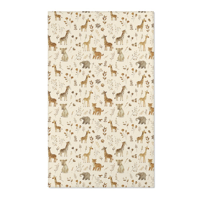Safari nursery area rug in tan and brown on cream