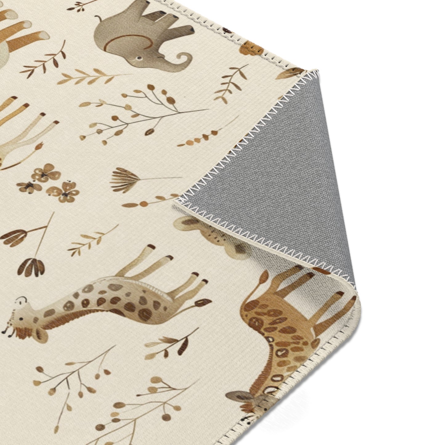 Safari rug in tan and brown on cream for a nursery floor
