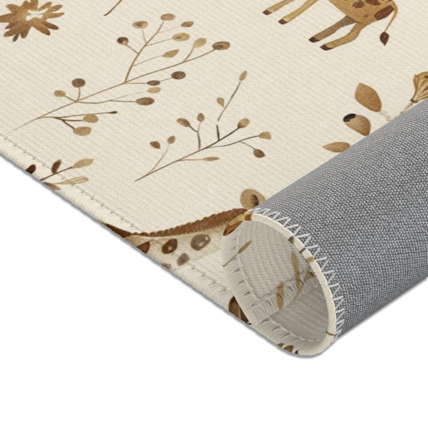 Nursery area rug in a tan, brown and cream palette