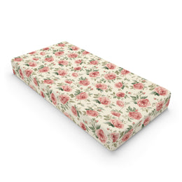 Heirloom Roses changing pad cover on a nursery changing table
