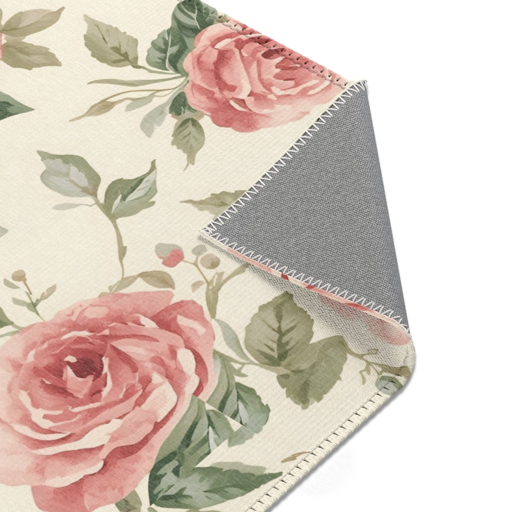 Rose chintz rug in pink and sage for a nursery floor