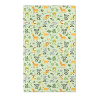 Rectangular jungle animal nursery rug shown from above
