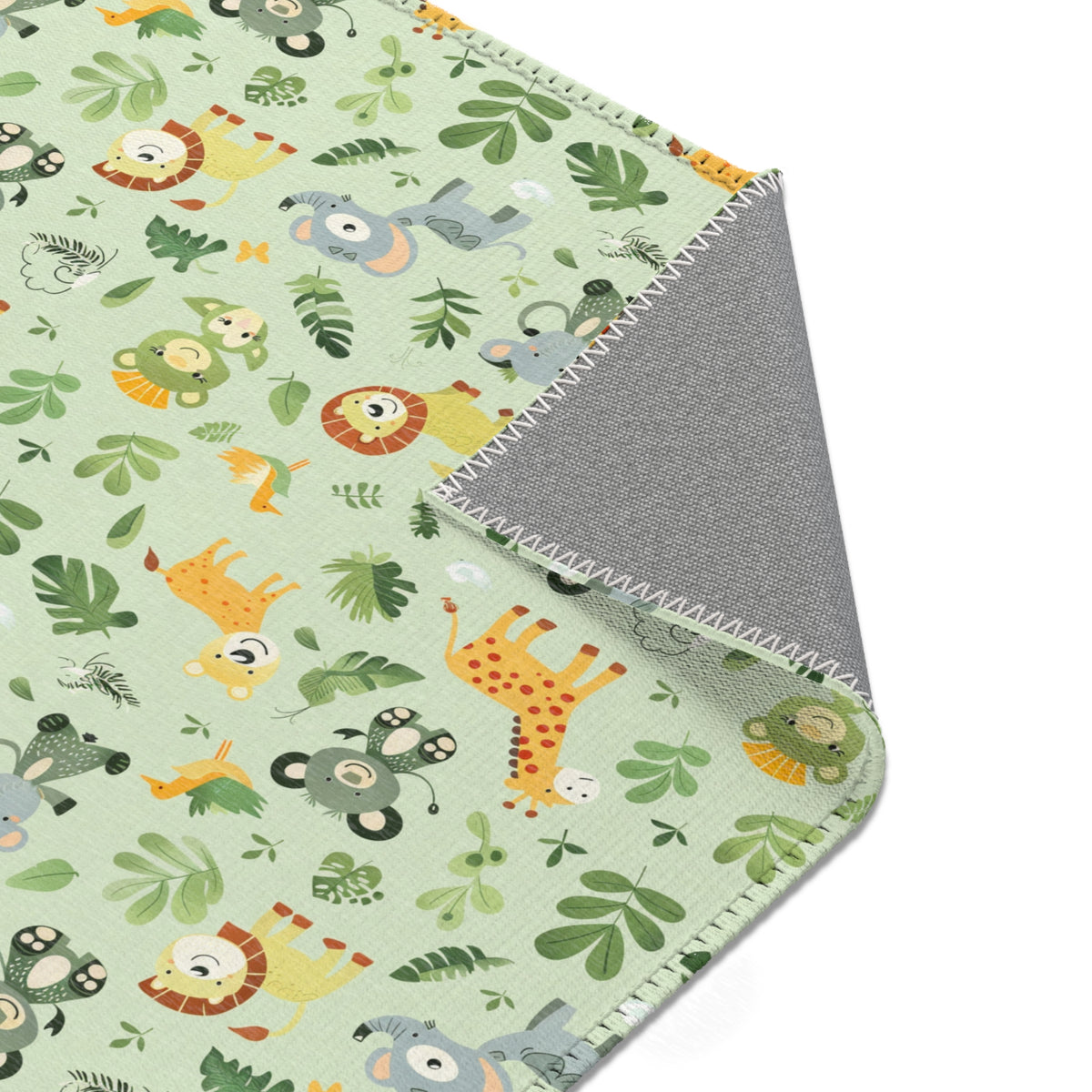 Jungle animal area rug styled with nursery furniture