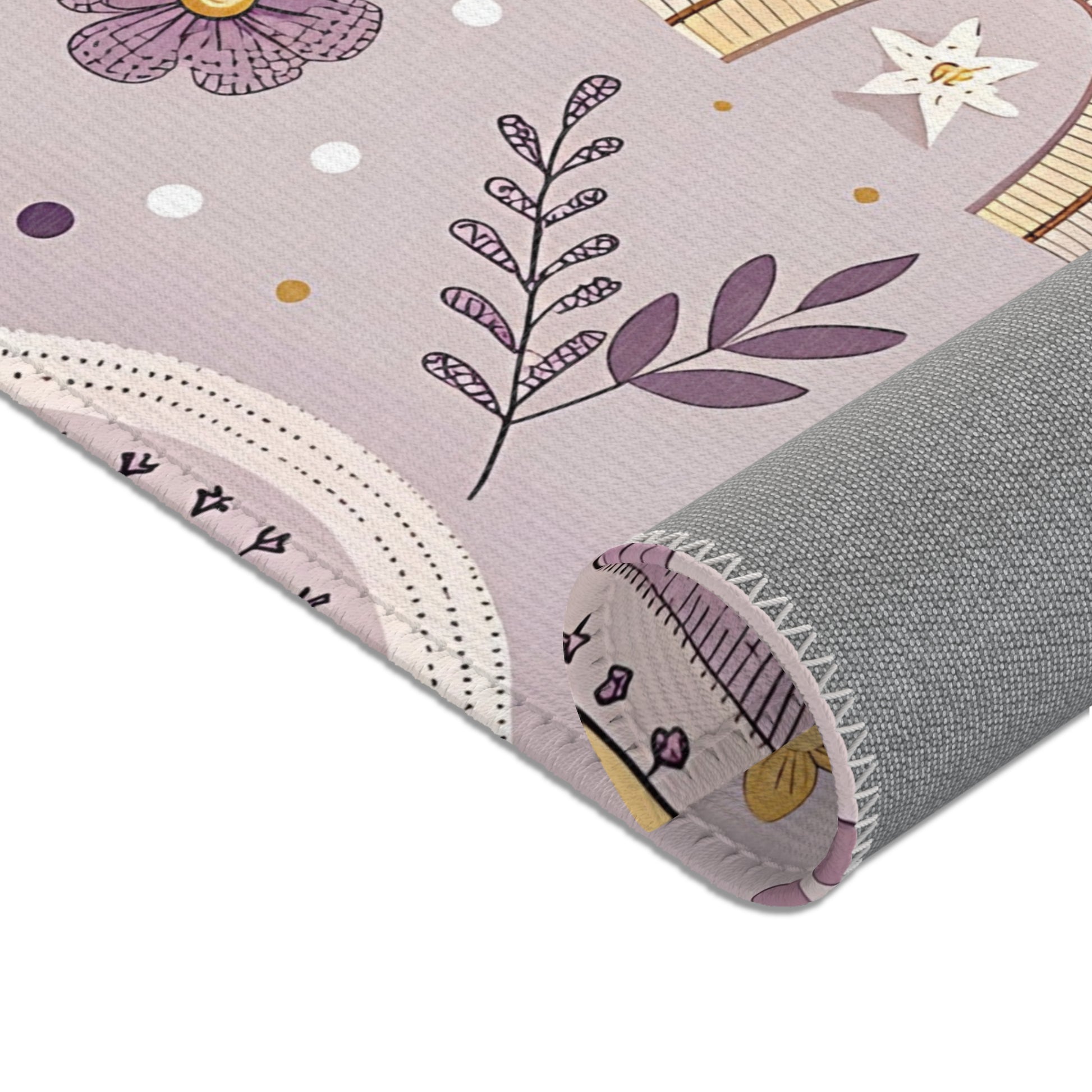 Arches and wildflowers printed across the nursery area rug