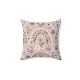 Lilac Meadow Arches decorative nursery pillow on a glider chair