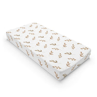 Linen Leaf changing pad cover on a nursery changing table