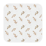 Linen Leaf hooded baby towel wrapped around a baby