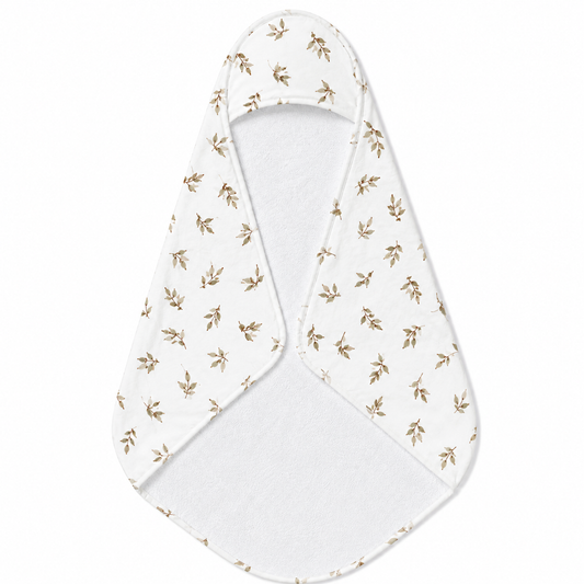Linen Leaf hooded baby towel wrapped around a baby