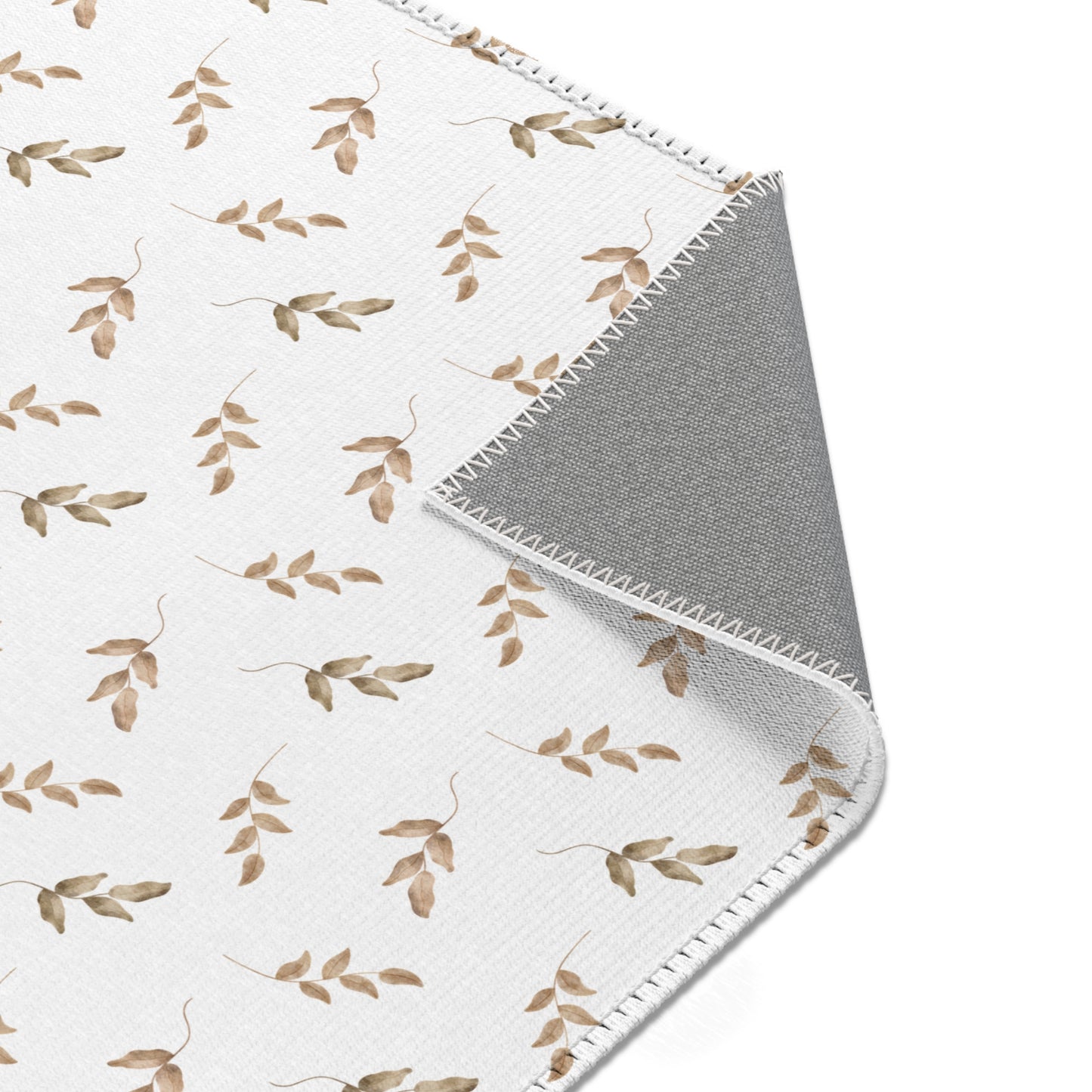 Nursery area rug printed edge to edge with leaf sprigs