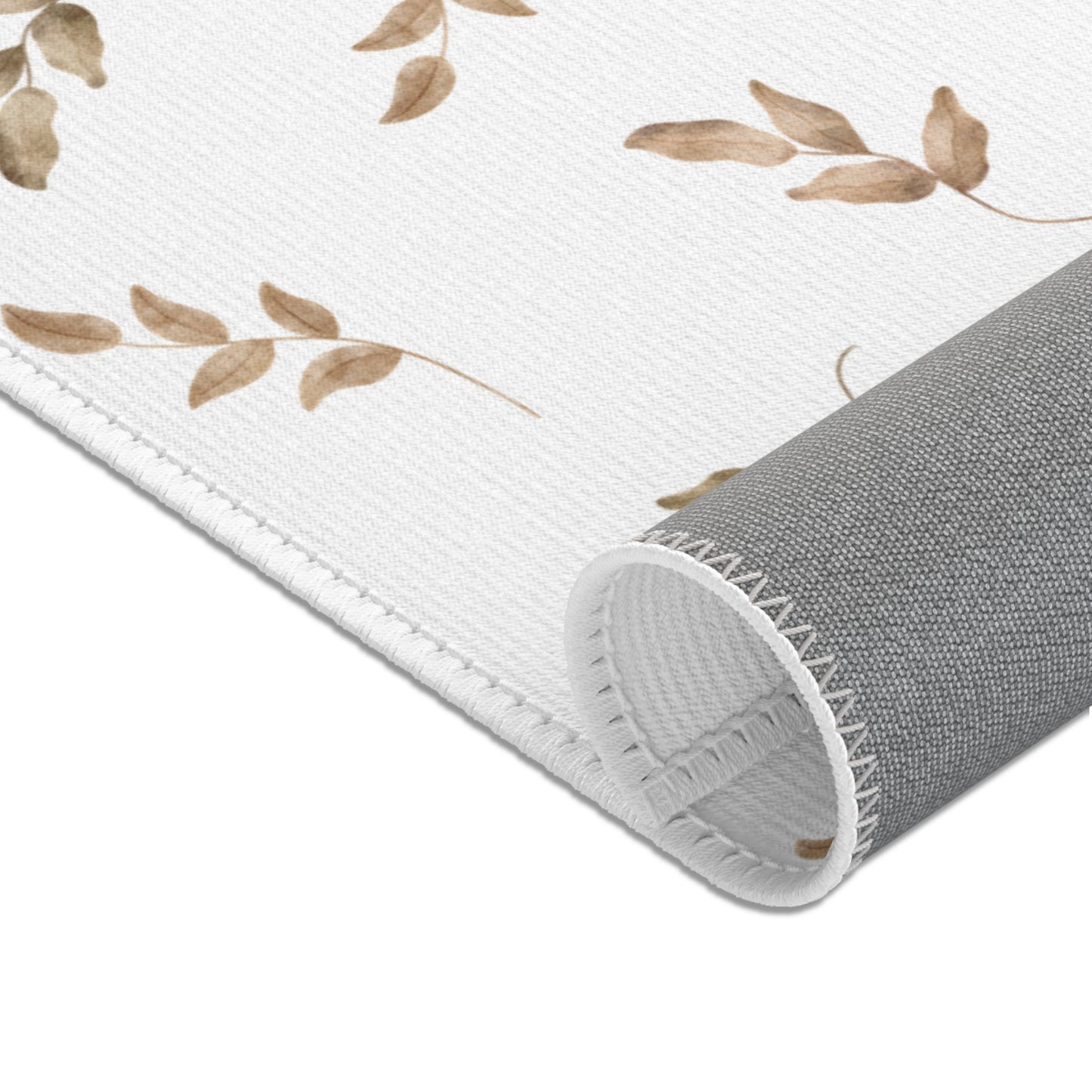 Corner detail of the Linen Leaf nursery area rug