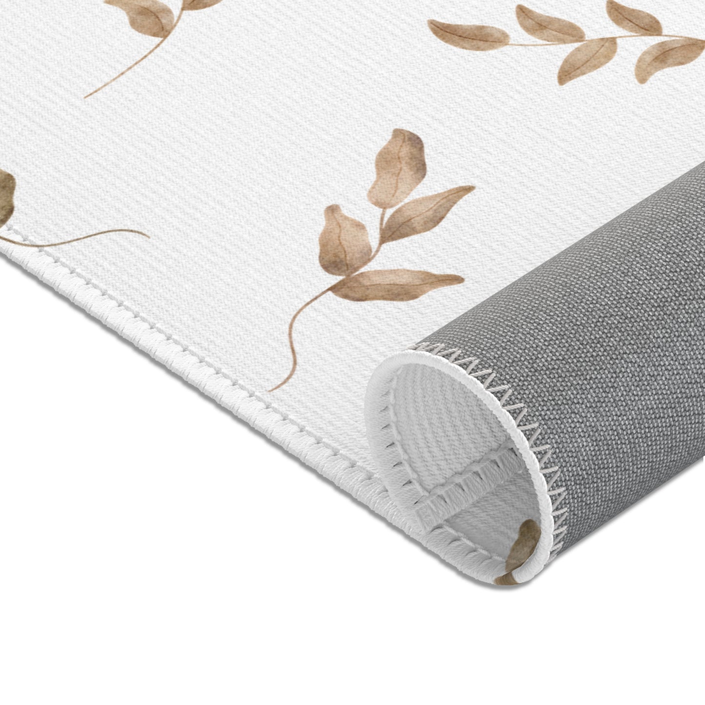 Nursery area rug in a quiet taupe, tan and white palette