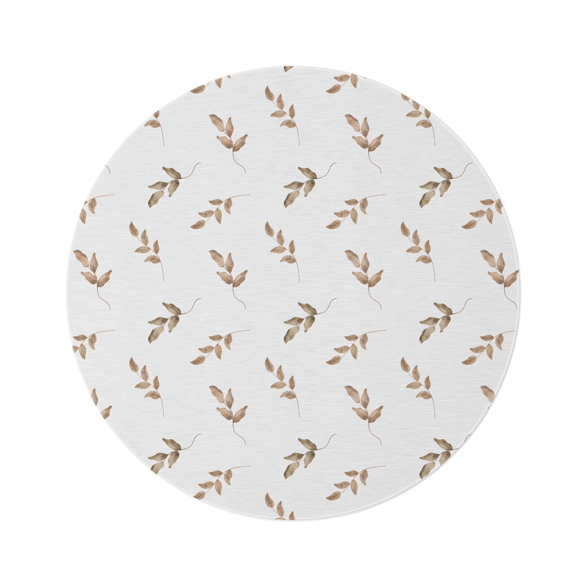 Linen Leaf round nursery rug on a baby room floor